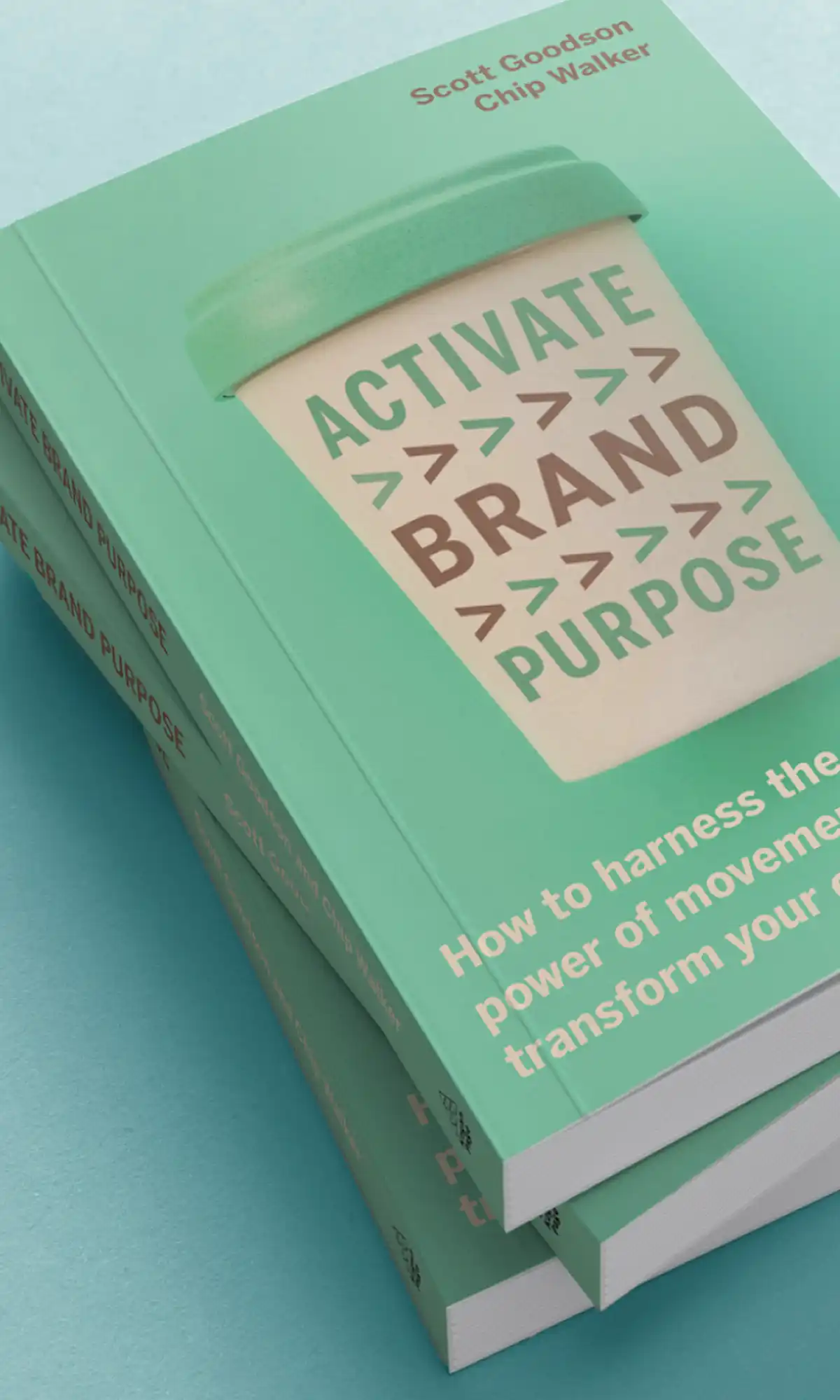 Stack of three light green books on a blue surface, with the top book showing "ACTIVATE BRAND PURPOSE" in a coffee cup design, authored by Scott Goodson and Chip Walker, with subtitle about harnessing movements to transform companies.